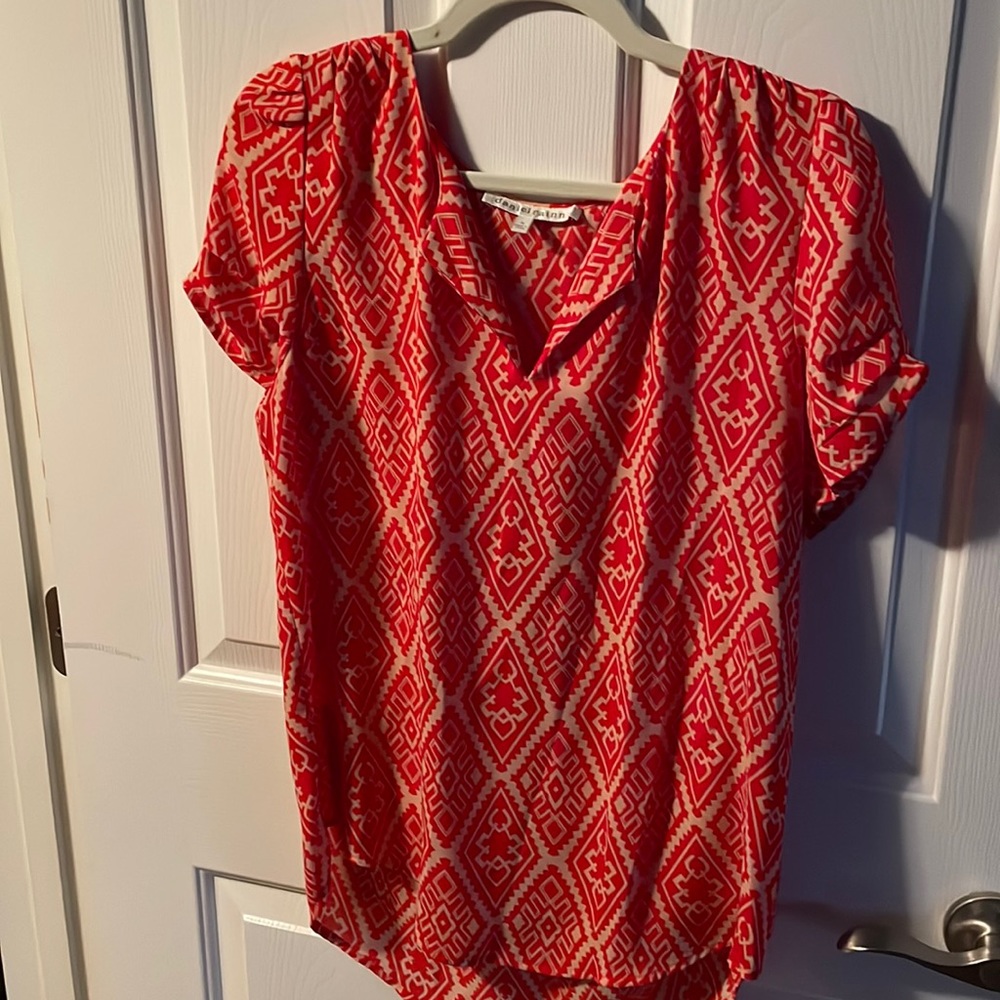 Like new red with cream printed like chiffon fabric top